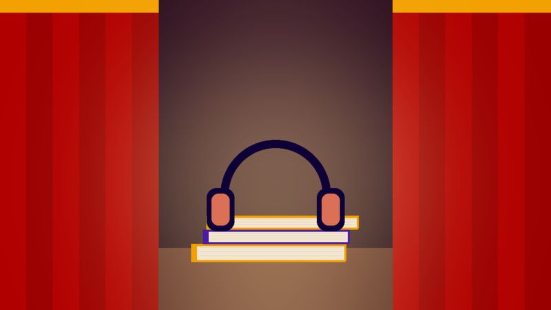 سمّاعتان فوق كتبٍ بين ستارتَي مسرح