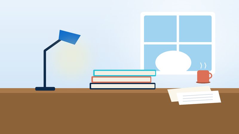 مكتبٌ عند نافذة عليه مصباحٌ وكتبٌ وأوراق وكوب
