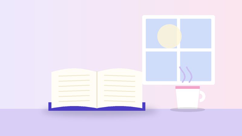 كتابٌ مفتوح وكوبٌ قرب نافذة
