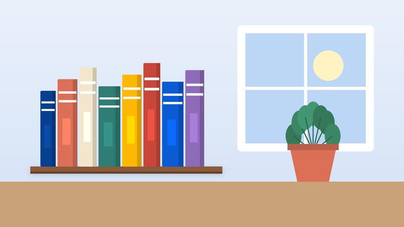 كتبٌ مصفوفة على رفٍّ قرب نافذة