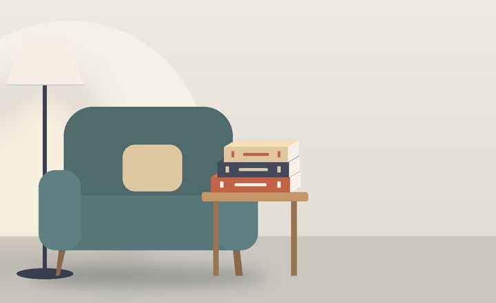 رسمٌ لركن قراءةٍ فيه مقعدٌ ومصباح وكتب