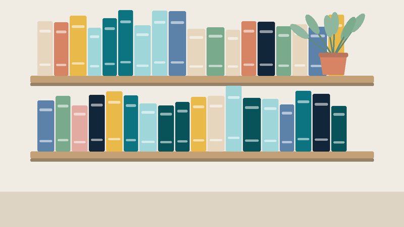 رفّان من الكتب الملوّنة ونبتة